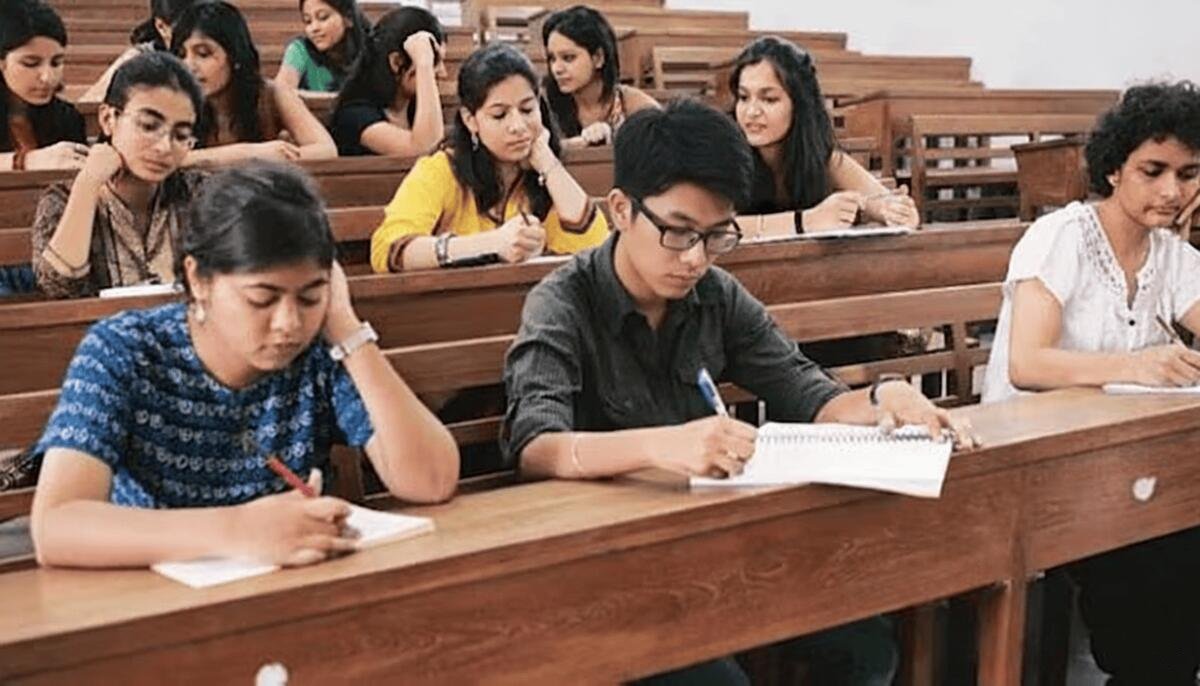 Students studying in phone-free classroom using ZenLocked lockable pouches
